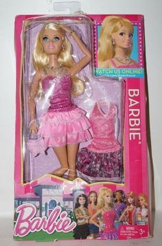 the barbie doll is wearing a pink dress