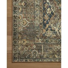 an area rug with various colors and patterns