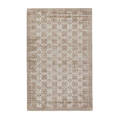 a beige and brown rug with an intricate design on the bottom, in front of a white background