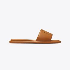 Chic comfort. The sport slide is made of soft padded leather that hugs the foot, with a cushioned foam insole for flexible support. The raised Double T is edged in metallic trim for subtle shine. Most Comfortable Sandals, Soft Sandals, Miller Sandal, Square Toe Sandals, Black Slippers, Woven Sandals, Tory Burch Sandals, Wide Shoes, Jelly Sandals