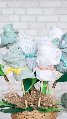 a basket filled with lots of diapers on top of a table