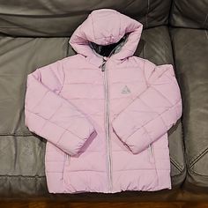 Stay Cozy And Fashionable With This Mid-Length Gerry Jacket . The Zip Closure, Elastic Cuffs, And Hood Make It Perfect For Any Weather. The Jersey Fabric And Tricot-Lined Pockets Keep Hands Warm, And The Protective Chin Guard Shields The Zipper. This Pink Jacket Features A Logo Accent And Functional Front Pockets With Zippers. This Basic Style Jacket Is Fit For Regular Use, And It Is Made Of 100% Polyester. Pink Kids, Pink Jacket, Gerry Weber, Stay Cozy, Basic Style, Kids Jacket, Hand Warmers, Puffer Jacket, Jersey Fabric