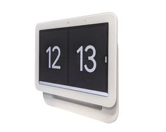 an electronic clock displaying the time on a white background with clipping path to twelve o'clock