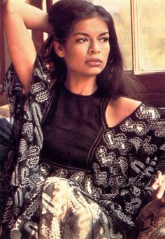 Iconic Bianca Jagger wearing a printed zandra Rhodes kaftan