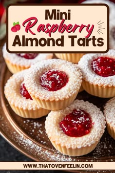 mini raspberry almond tarts on a plate