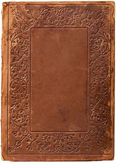 an old brown leather book with intricate designs on the front and back cover is shown