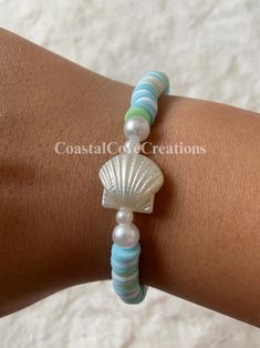 New bracelet ALERT️ Introducing the new collection of SUMMER 🌊 bracelets at Coastal Cove Creations!😉 With so many new designs and choices, I know that YOU can find a piece of jewelry that your heart desires.❤️ My bracelets can make any outfit stand out among the rest!🤩 * * * * * ✨Bracelet size is 6.5 inches✨ NOTE: My bracelets are able to stretch!! This means it can comfortably fit sizes 6-7 inches!🫧 * * * * * BRACELET CARE 🐣 Dos and Don'ts of bracelet care! DOS - Be careful with it! 🥰  - Wear it!! Everyone looks great with bracelets - Find a safe place for it when you are not wearing it! Keep away from pets and small children! 🐶 🐱 👶 DON'TS - Cut it ✂️  - Eat it 👄  - Overstretch it 🖐️  - Get it very dirty (can stain the beads and won't come off) 💦  ⚠️ PLEASE READ THIS!! ⚠️ If y Bracelets Summer, Shell Island, Clay Bead Bracelet, Beach Bracelet, Bracelet Summer, New Bracelet, Beach Bracelets, Clay Bead, Summer Bracelets