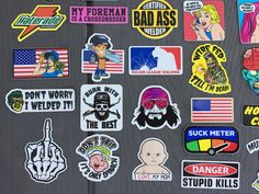 various stickers on the back of a refrigerator