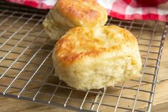 two biscuits sitting on top of a cooling rack