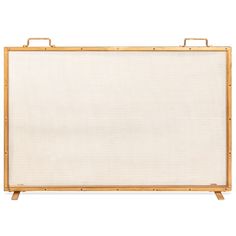 an old wooden frame with white canvas on it and bamboo handles, isolated against a white background