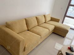 a living room with a couch and table