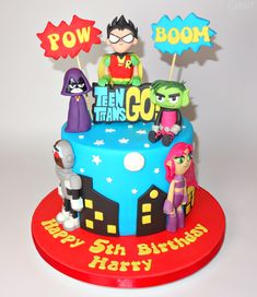 a birthday cake with cartoon characters on it