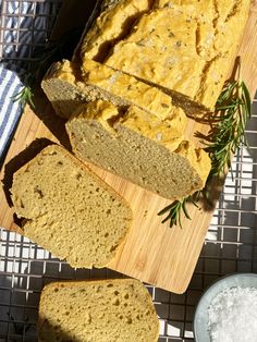 slices of bread sitting on top of a cutting board