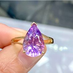 10k Yellow Gold 5 Carat Pear Shape Amethyst Ring - Teardrop Birthstone Ring New! Never Worn! Retail Price - $339 Solid 10k Yellow Gold Total Weight - 5 Carats Natural Amethyst - Stunning Color! Size - 9, Can Be Sized To Fit You February Birthstone Gift Box & Jewelry Polishing Cloth Included #0801120 Stunning Pear Shaped 5 Carat Genuine Amethyst Gemstone In A 10k Yellow Gold Split Shank Ring. Solid Gold, Natural Gemstone, Genuine Diamonds. Big Look! Perfect Cocktail, Dinner, Statement, Fashion Or Pear Shaped Amethyst Ring, Amethyst Engagement Ring Gold, Chrome Hearts Ring, Lavender Stone, Ring Teardrop, Square Jewelry, Amethyst Ring Engagement, Cocktail Dinner, Gold Color Ring