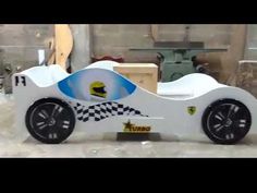 a toy race car made out of cardboard