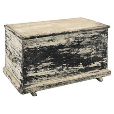 an old wooden box with some paint on it's sides and one drawer open