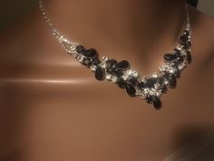 "Black Bridal jewelry set, Black , Silver Necklace with Earring, wedding jewelry set, Bridesmaid Crystal Rhinestone Jewelry, Teardrop Crystal Floral Rhinestone Necklace Color : Black, Silver Necklace Size : 14\" + 5.5\" L Decor Size : 1.5\" L Earring Size : 1.75\" L Please contact us for any special custom order ." Black Rhinestone Necklace, Black Diamond Jewelry Set, Black Crystal Jewelry Sets For Wedding, Black Rhinestone Jewelry For Wedding, Black Rhinestone Wedding Jewelry, Black Wedding Jewelry With Jewels, Elegant Black Jewelry Set For Wedding, Black Jeweled Necklaces For Wedding, Black Cubic Zirconia Necklace For Wedding