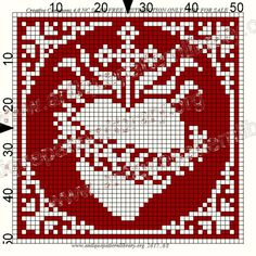 a red and white cross stitch pattern with an apple in the center, surrounded by smaller squares