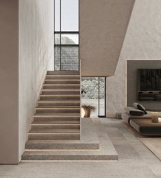 the stairs in this modern house are made of concrete