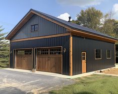 a two car garage with an attached loft