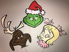 the grinch masks have been made to look like they are wearing santa's hats