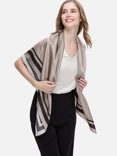 The Silk Duo Wrap is the ultimate versatile piece for breezy layering. Made from 100% silk, it effortlessly transitions from a chic wrap to an elegant scarf. Its oversized cut and minimal hem detail offer a relaxed feel, combining comfort and style seamlessly. 100% Silk: Crafted from 16 momme silk, it boasts a smooth, pearl-like gloss that drapes beautifully. All-Season Comfort: Breathable, hypoallergenic, and moisture-retaining, it's perfect for sensitive skin. Versatile Elegance: The 2-in-1 de Elegant Scarf, Elegant Scarves, Cashmere Beanie, Cashmere Wrap, Cashmere Scarf, Sensitive Skin, Layering, Cashmere, Silk