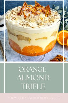 orange almond trifle in a glass dish with an orange slice on the side and text overlay reading orange almond trifle