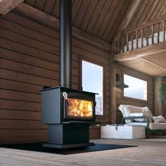 a wood burning stove sitting inside of a living room