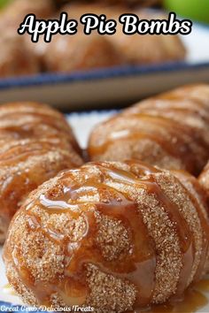 Three fried apple bombs covered in a caramel sauce sitting on a white plate. Apple Pie Finger Food, Seasonal Treats Dessert Recipes, Apple Pie Deserts, Apple Pie Treats, Fun Treat Recipes, Apple Skins What To Do With, Fall Treats Baking, Yummy Apple Desserts, Fun Apple Recipes