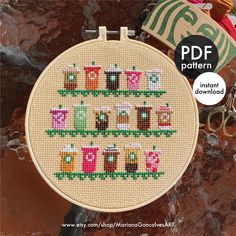 a cross stitch pattern with the words coffee on it and some scissors next to it