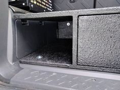 the inside of a vehicle with its trunk open