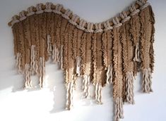 there is a wall hanging made out of rope