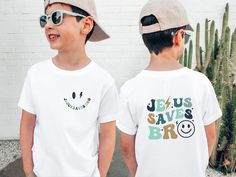 Jesus Saves Bro T-Shirt, Christian Toddler Shirt, Kid Religious, Shirts for Kids               Trending Kids Outfits, Christian Shirt, Bible Verse Tee, Jesus Shirt, Faith Tshirt Materials: White, Natural & Pink: 100% cotton H. Gray: 90/10% cotton/polyester Production time: 1-3 business days Shipping time: 2-6 days Delivery time: Usually within 3-9 days depending on your location and selected shipping service. Care Instruction: Inside out, wash with delicate cycle. Lay flat to dry Do not bleach Do not iron directly onto the design Do not dry clean SoGoodKids to see more from our shop, please visit https://www.etsy.com/shop/SoGoodKids Childrens Ministry Shirts, Christian Shirts For Kids, Kids Christian Shirts, Kids Tees Design, Christian Toddler Shirts, Christian Kids Shirts, Funny Toddler Shirts Boys Christians, Christian Kid T Shirt, Kids Tshirt Designs