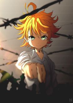 an anime character with blonde hair and green eyes pointing to the side while standing in front of barbed wire