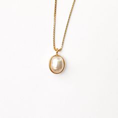 A gorgeous baroque pearl in a gold vermeil surround setting. Pearls are said to bring calm and peace to the wearer. Dress this up or down, pearls are known for symbolizing love, purity, and luck. This lightweight, eye-catching pendant dances against your neck for a minimal, stackable, everyday necklace. Comes on a box-style necklace chain. Product Info: The pearl measures approximately 9mm (0.35") by 8mm (0.3") in size. Pearls are unique and they vary slightly in shape and size and may appear sl Venus Necklace, Calm And Peace, Line Love, Studded Necklace, Pearl Necklaces, Everyday Necklace, Gift Card Sale, Style Necklace, Baroque Pearls