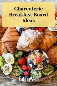 a plate full of croissants, fruit and bread with the words charlotte's breakfast board ideas