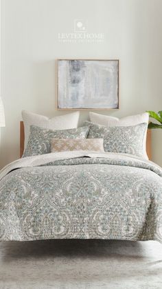 the comforter is neatly made and ready to be used in this bedding set