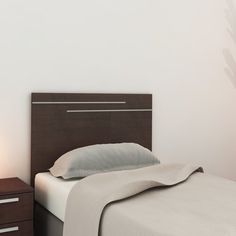 a bedroom with a bed, night stand and nightstand