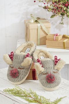 Toasty toes and a ready smile – these adorable slippers are merry-comfortable. Acrylic sweater knit uppers have a pompom nose and plaid antlers. Christmas Slipper Gifts, Christmas Gift Slippers, Reindeer Slippers, Acrylic Sweater, Coldwater Creek, Family Holiday, Sweater Knit, Antlers, Home Gifts