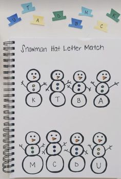 a snowman hat letter match is shown on a notebook with letters and numbers in the background