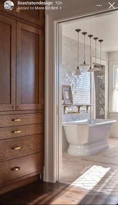 the bathroom is clean and ready to be used as a bathtub or shower stall