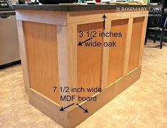 the kitchen island is labeled with measurements for each cabinet and countertop area in order to make it stand out from the rest of the room