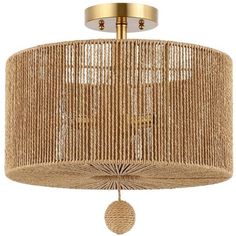 a light fixture with a rattan shade hanging from it's center point,