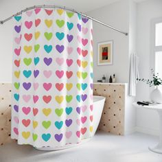 a colorful shower curtain with hearts on it