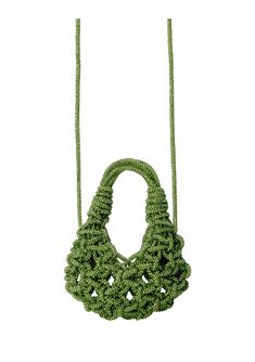 a green handbag hanging from a string