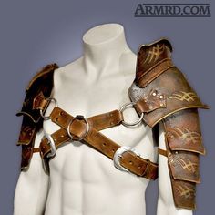 a white mannequin with brown leather armor on it's chest and arms