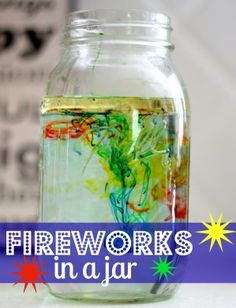 there is a jar filled with water and other things to make it look like fireworks in a jar