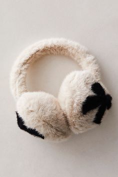 The perfect pair to add to your cold-weather accessories collection, these fun and fuzzy ear warmers are featured in a faux fur fabrication with bow printing at sides for the ideal femme fishing touch. | So Sweet Ear Warmers by Hansel From Basel at Free People in White Ear Muffs, Accessories Collection, Cold Weather Accessories, Earmuffs, Ear Warmers, So Sweet, Basel, Crochet Fashion, Boho Clothing