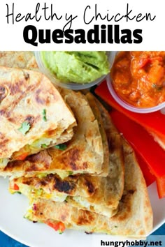 healthy chicken quesadillas on a plate with guacamole