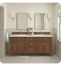 a bathroom with double sinks and mirrors on the wall